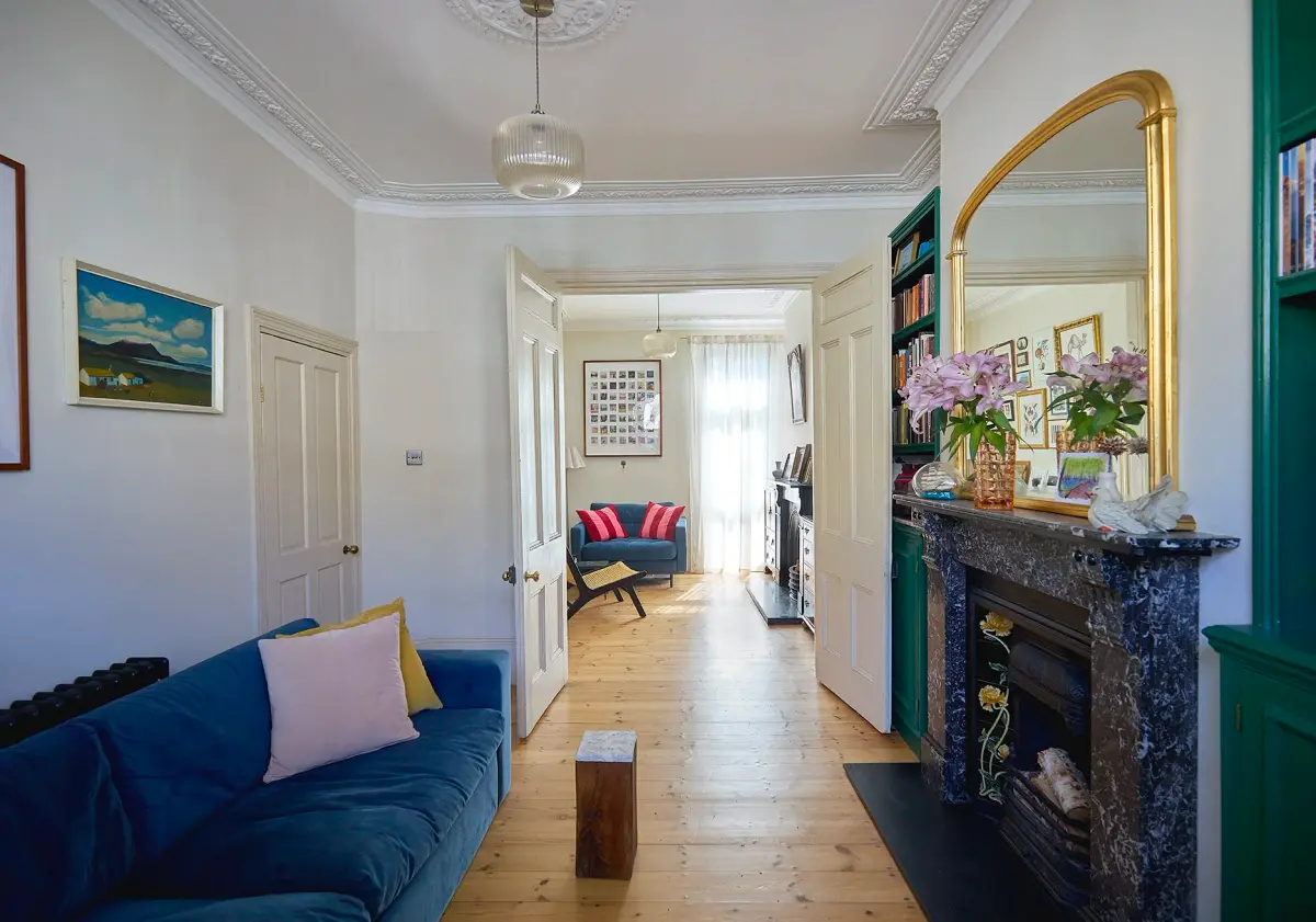 Solid oak herringbone parquet floor running throughout the ground floor